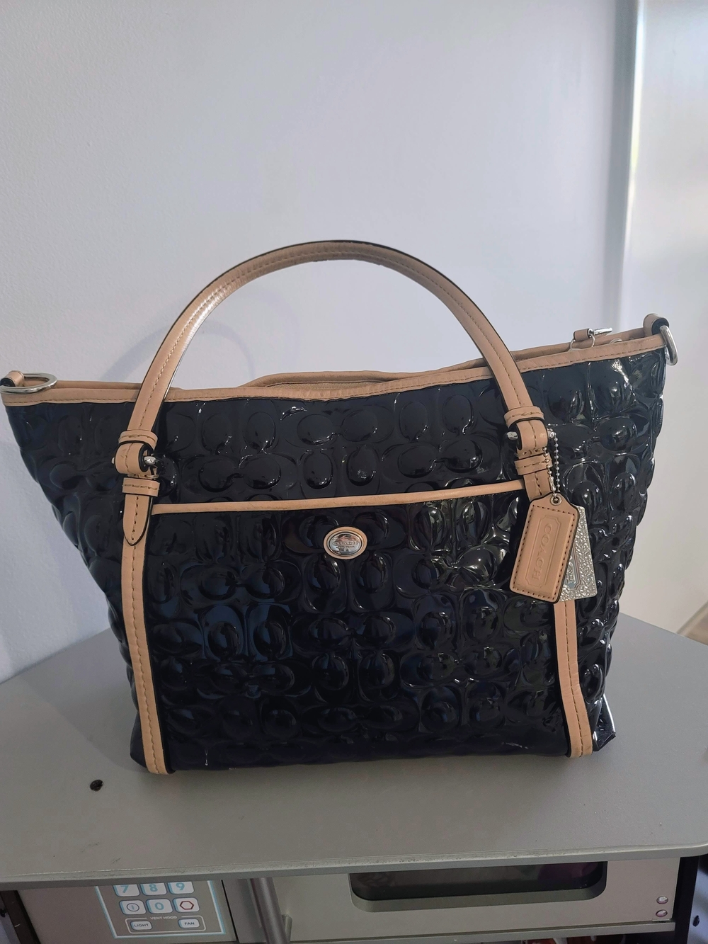 Coach Patent Black Tote with Tan Trim and Charm